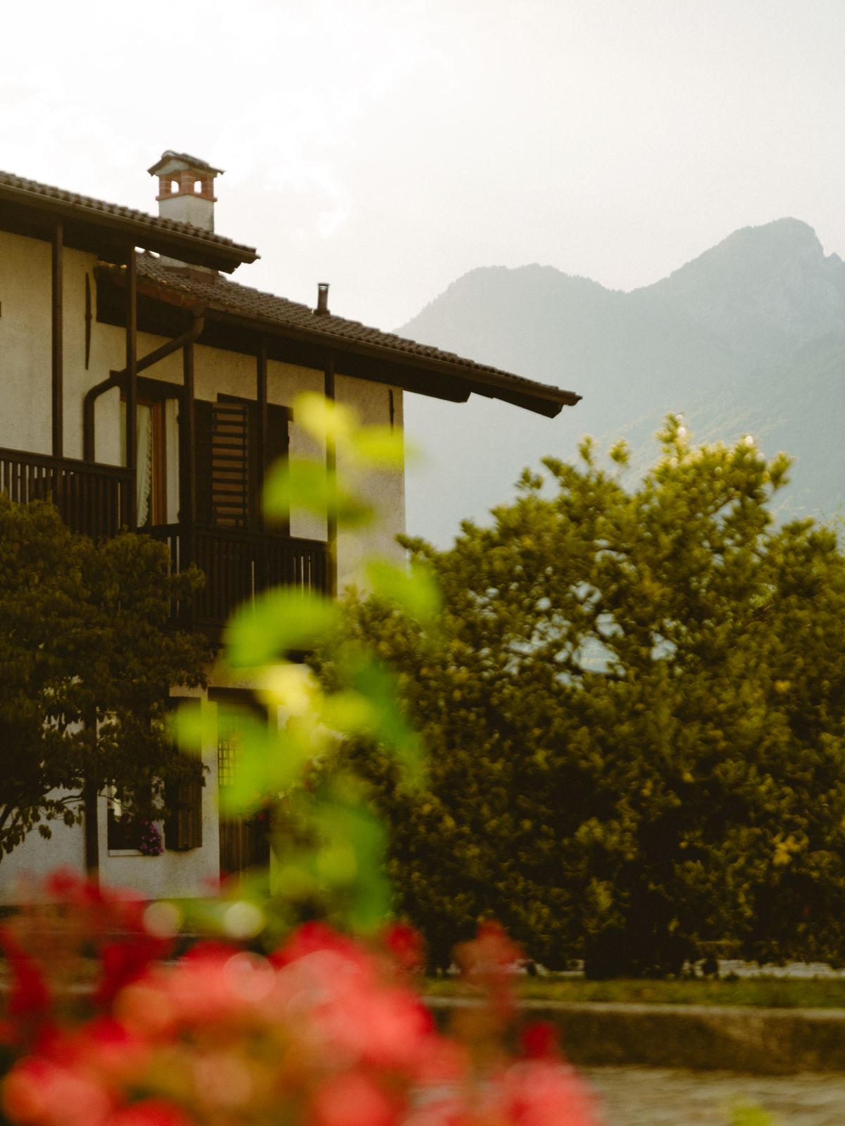 Farmhouse and mountains at dusk